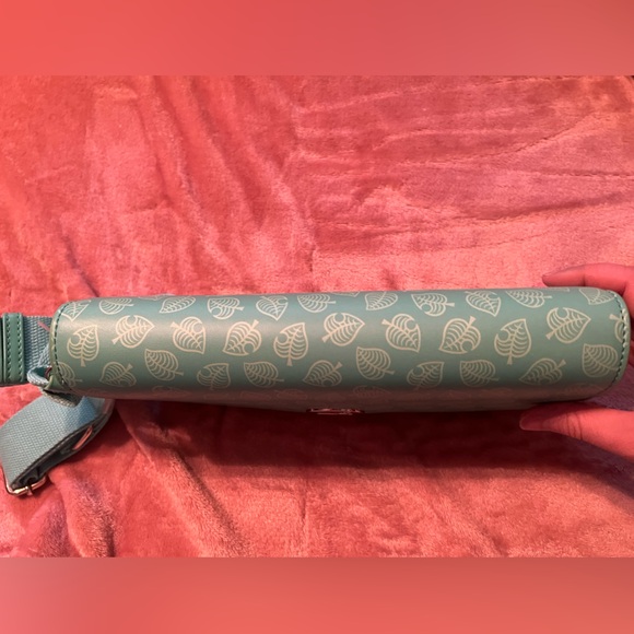 Animal Crossing Nintendo Switch Lite case. Never used, with strap. - Picture 3 of 10